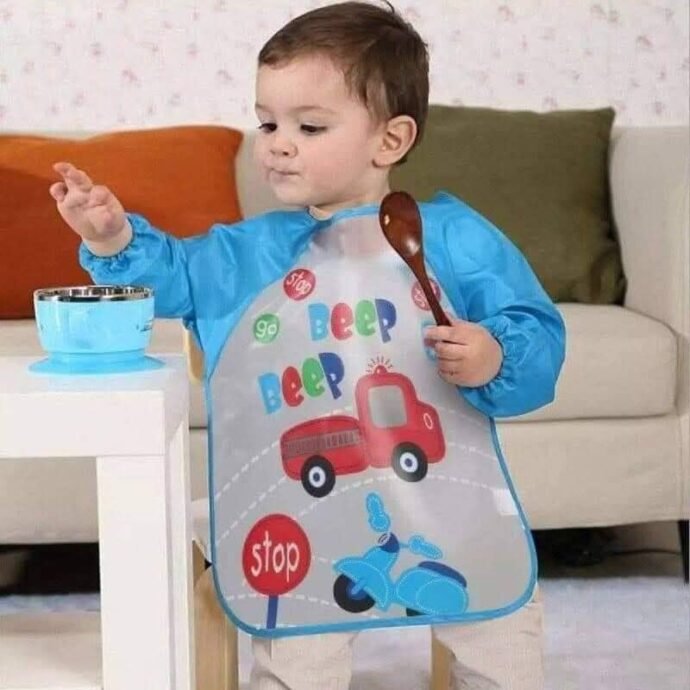 ⁦المريلة السحرية للأطفال بكم - وداعاً لبقع الأكل واللعب⁩ - الصورة ⁦3⁩
